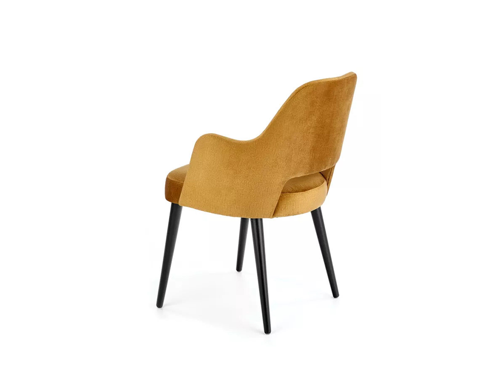 Zadní pohled na moderní židli MIREK 4 s jemným sametovým potahem a štíhlými černými nohami, designový kousek do jídelny.