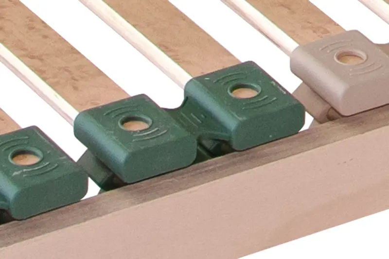 Detail pouzder lamel rostu Portoflex Mega: zelena a svetle bezova odpruzena pouzdra a lamely v drevenem ramu